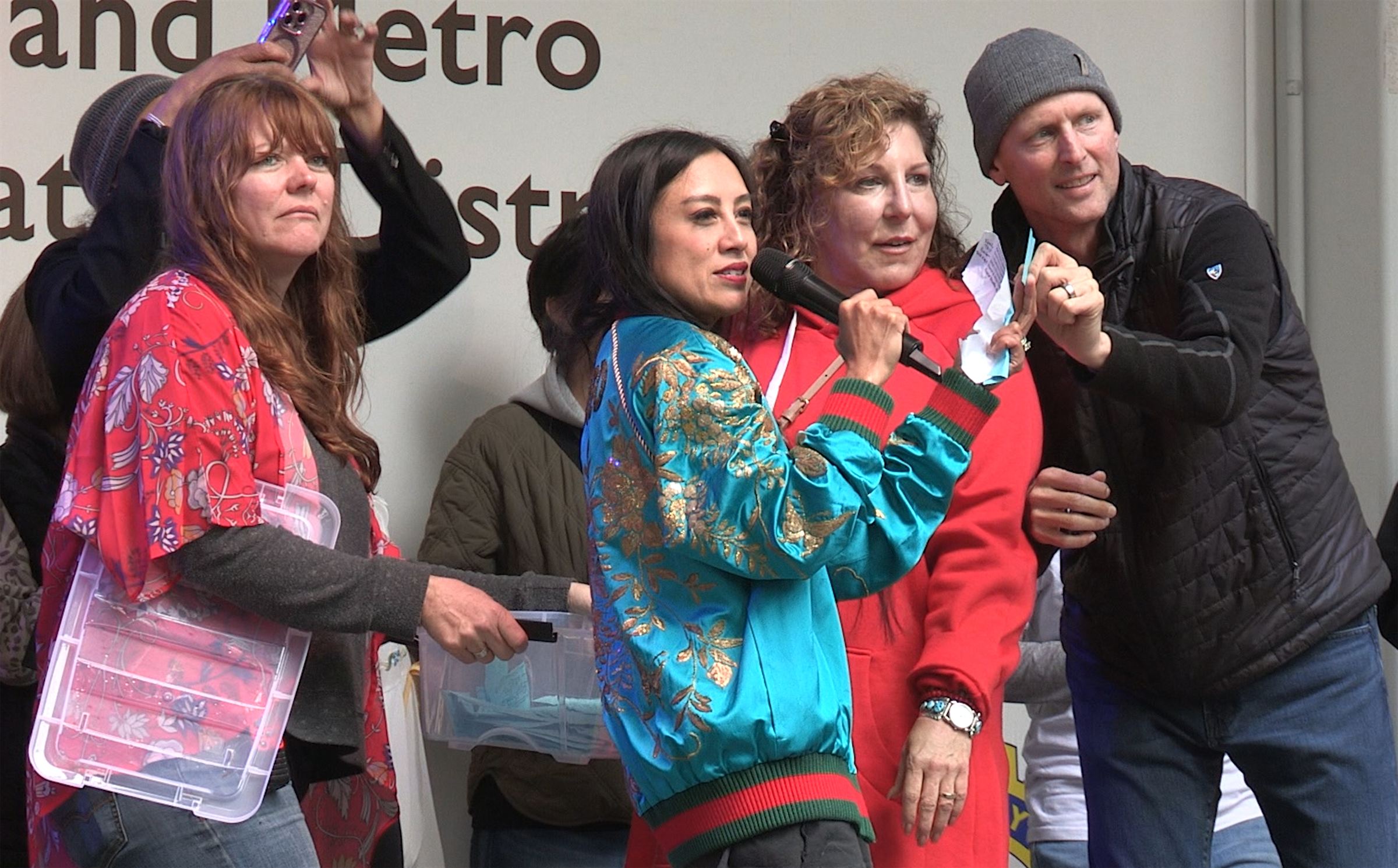 Festival performer and audience in a featured moment.